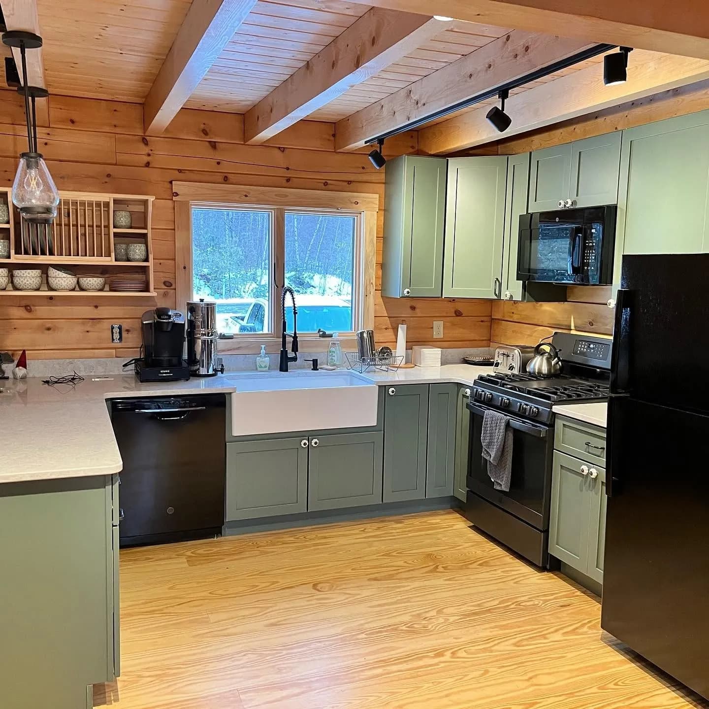 Sage green cabin kitchen — General Contracting project in Lakes Region, NH by A&E Home Improvement