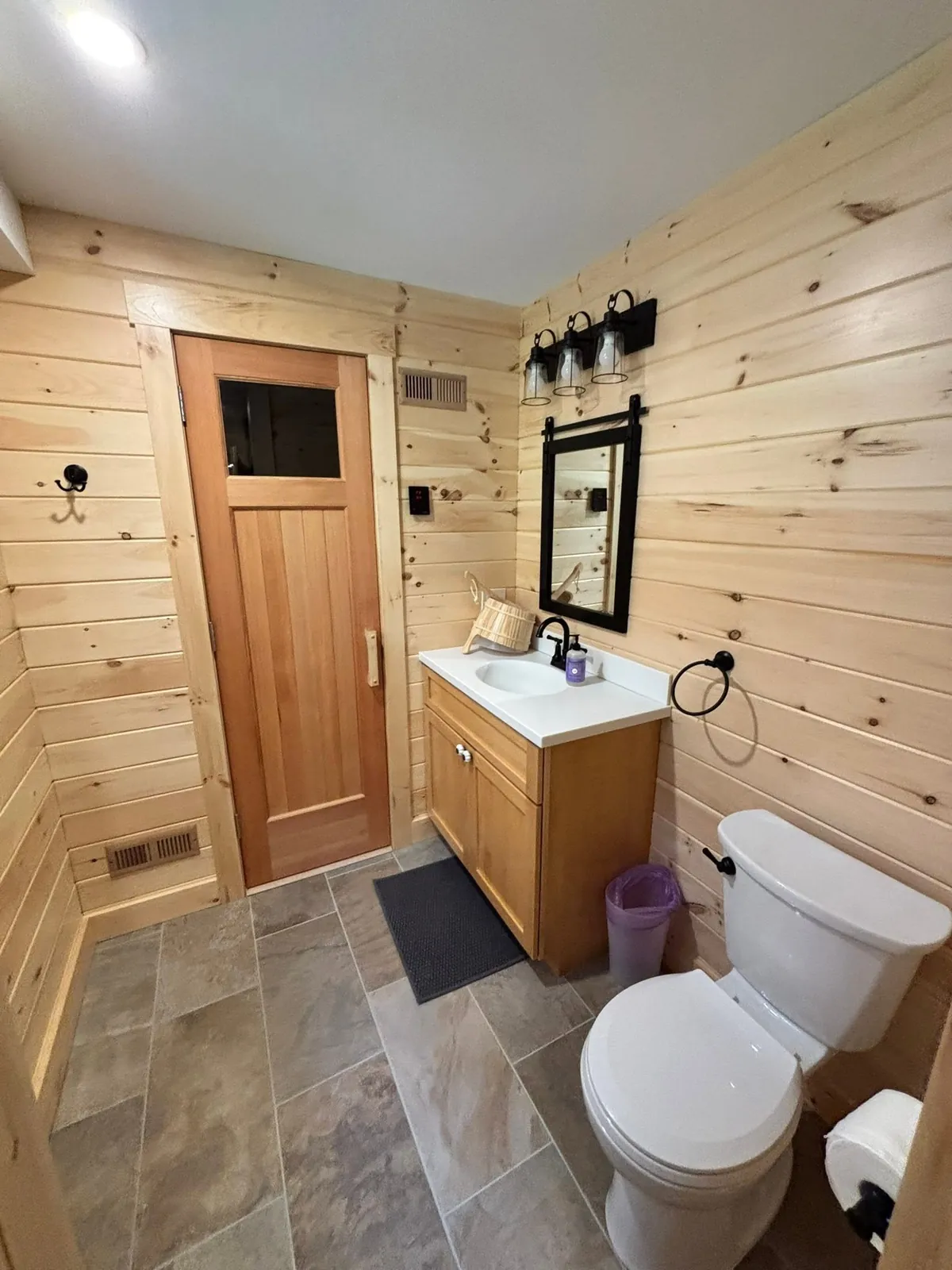 Pine-paneled bathroom — General Contracting project in Lakes Region, NH by A&E Home Improvement
