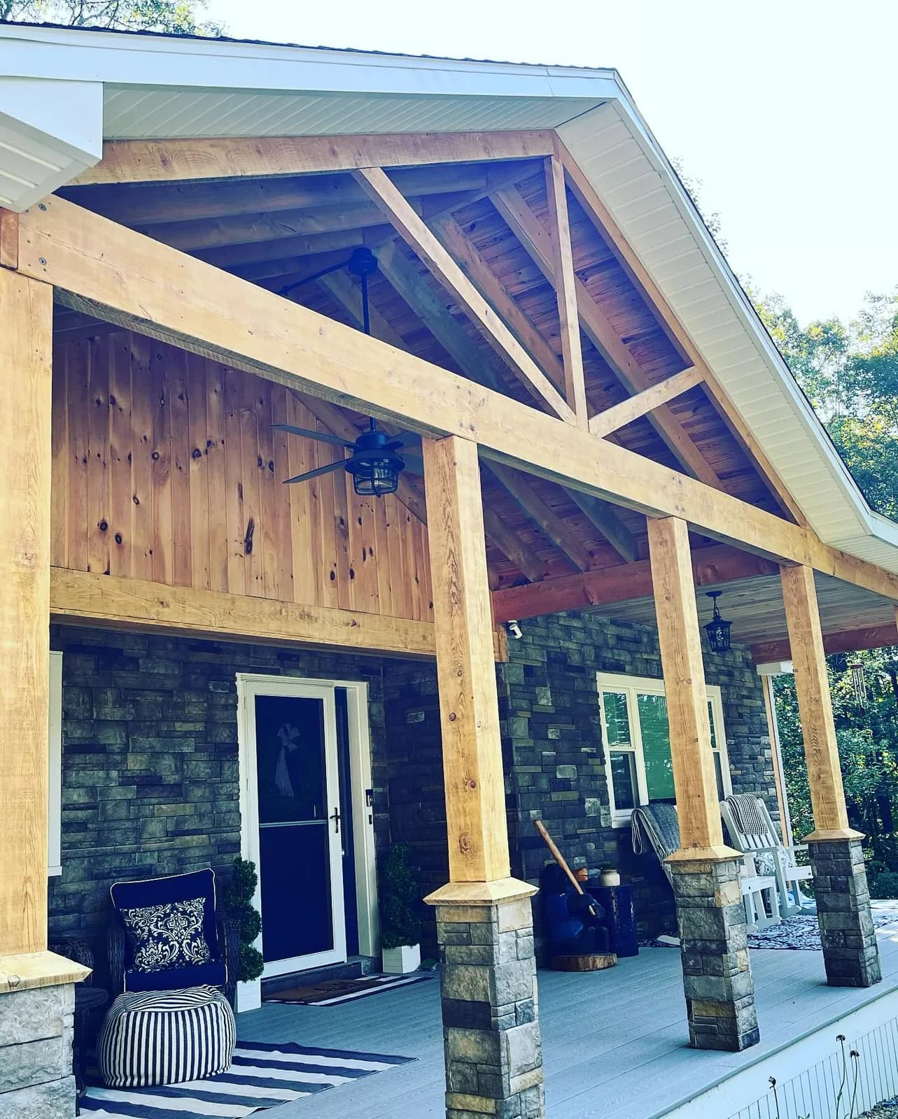 Timber porch with stone-veneer columns — Custom build project in Central NH by A&E Home Improvement