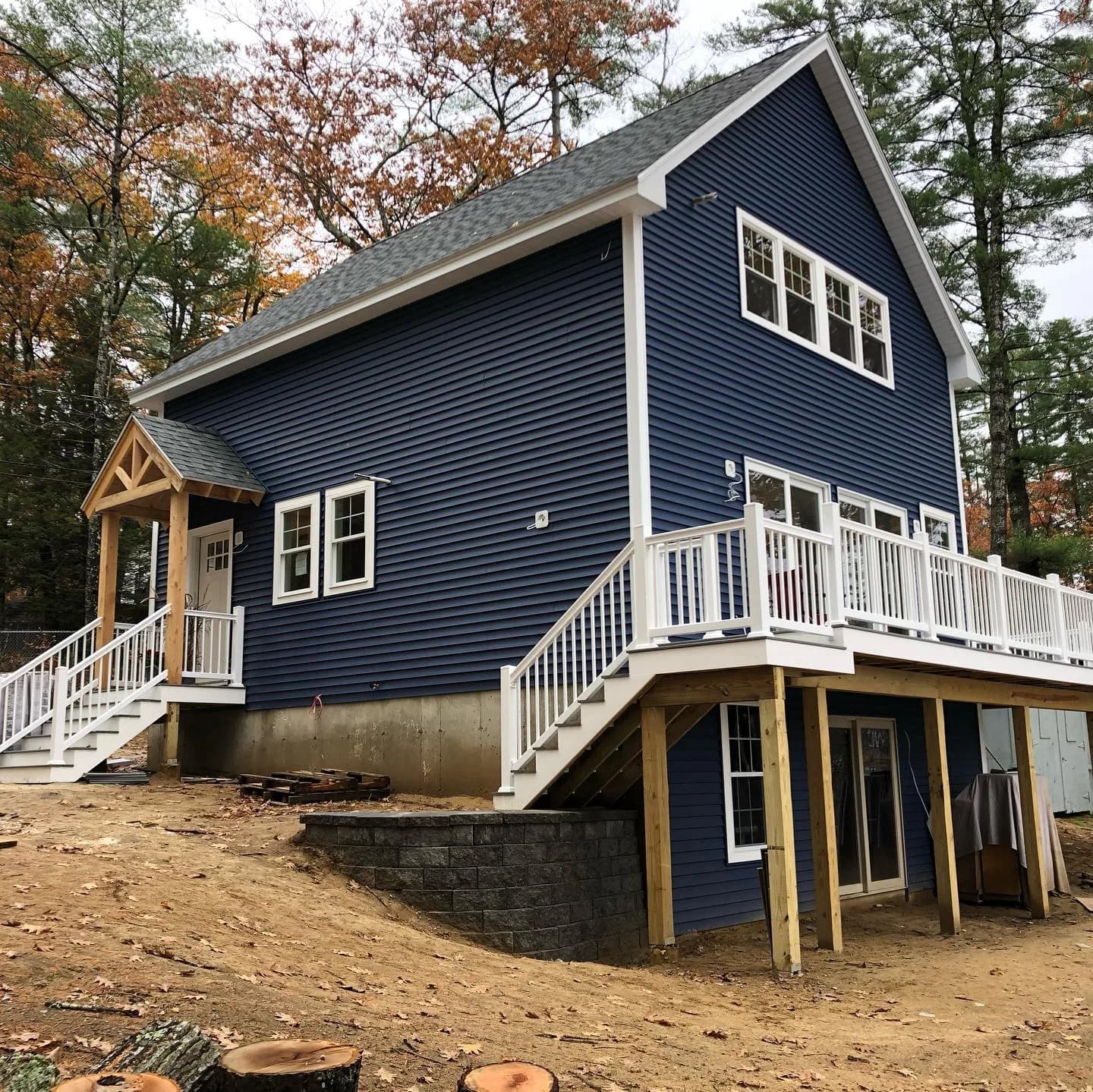Blue lap siding on a New Hampshire home built by A&E Home Improvement