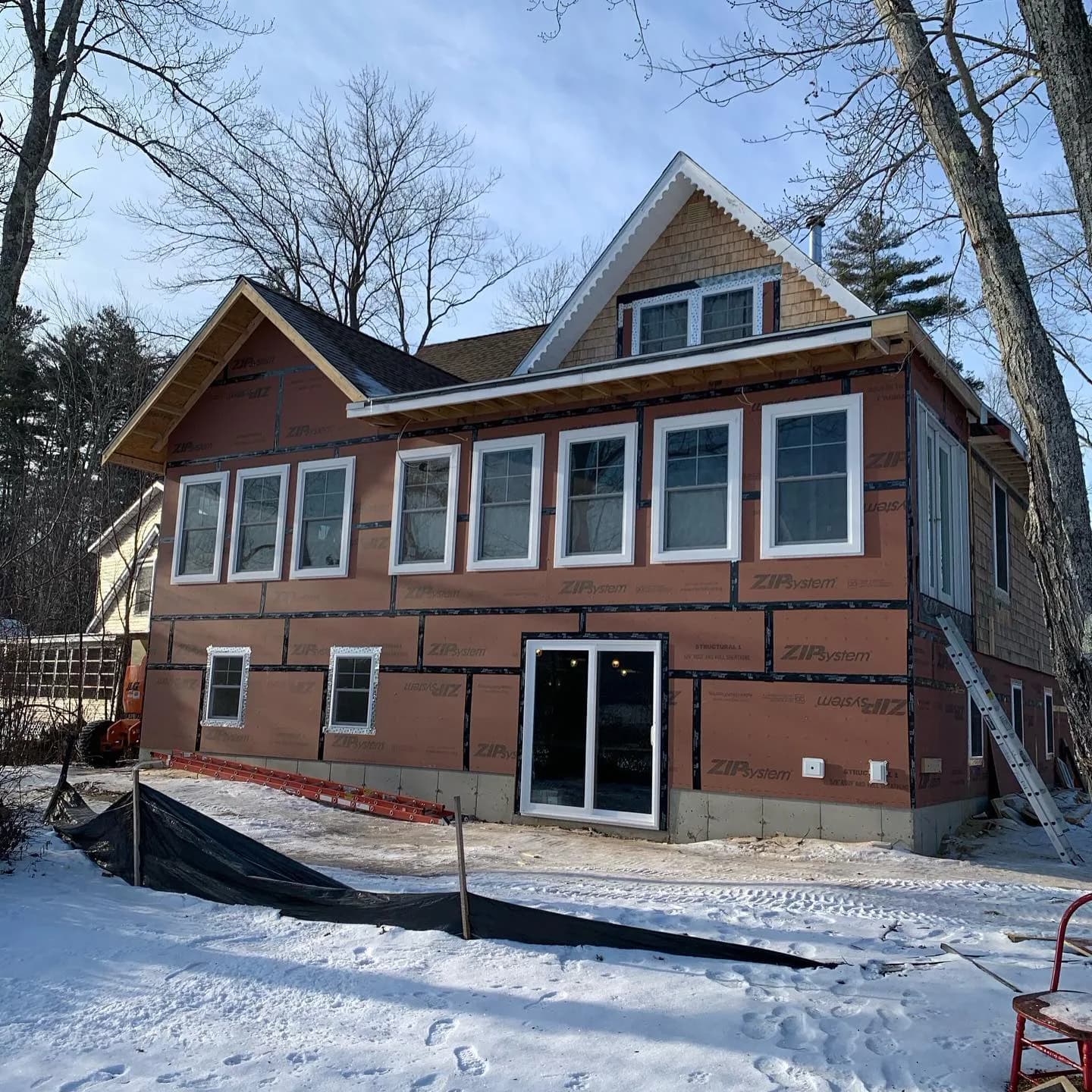New windows and a patio door on an A&E Home Improvement build in New Hampshire