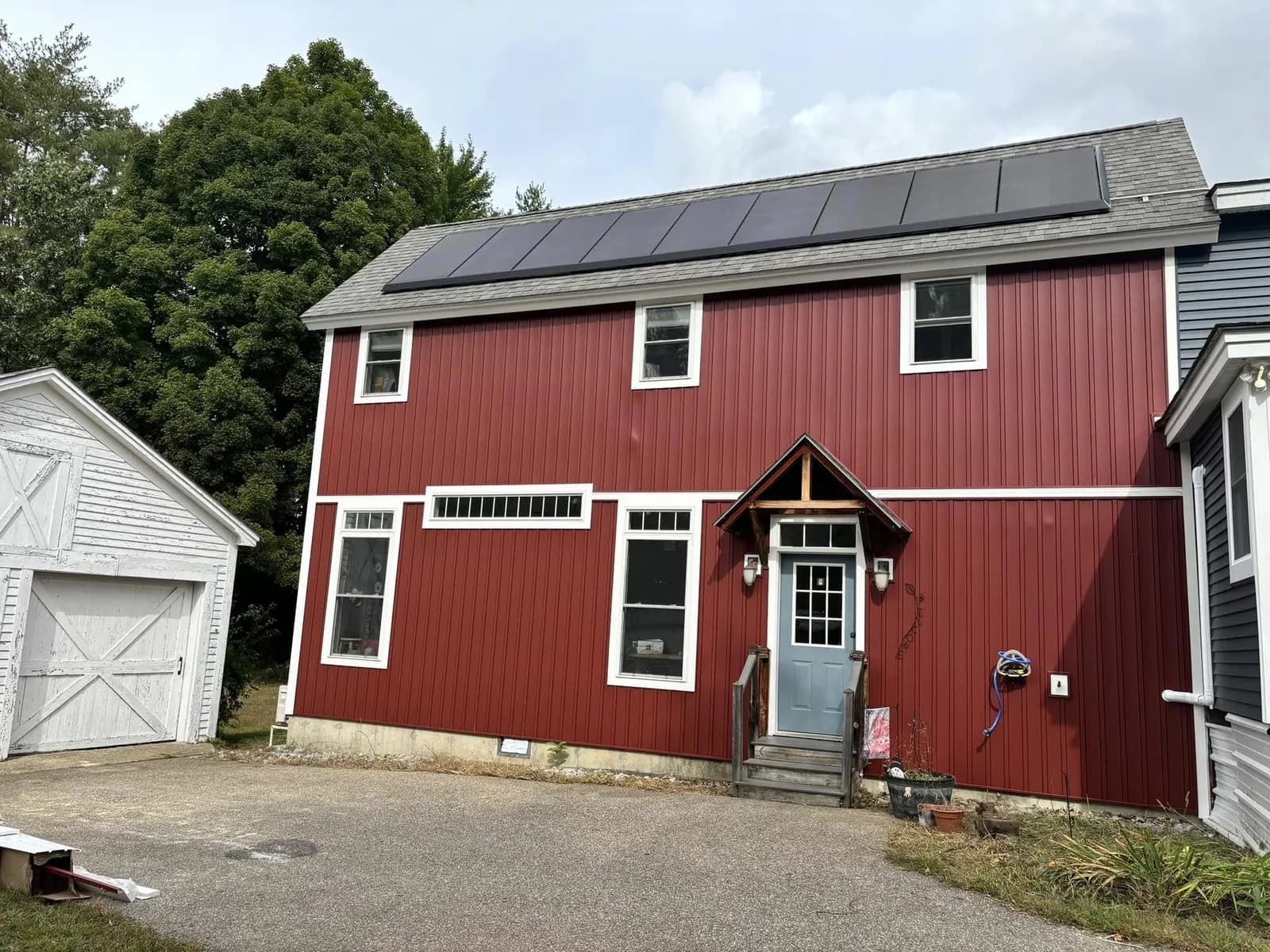 Red board-and-batten siding — Siding project in Southern NH by A&E Home Improvement