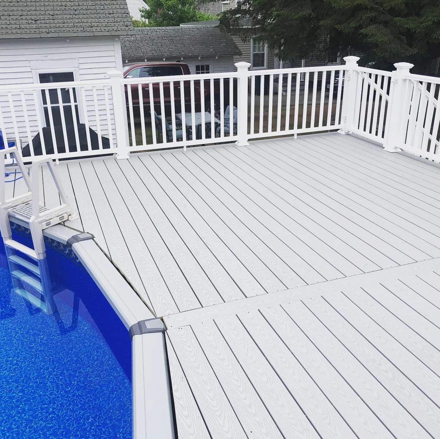 Large composite deck with railing — Decks project in Central NH by A&E Home Improvement