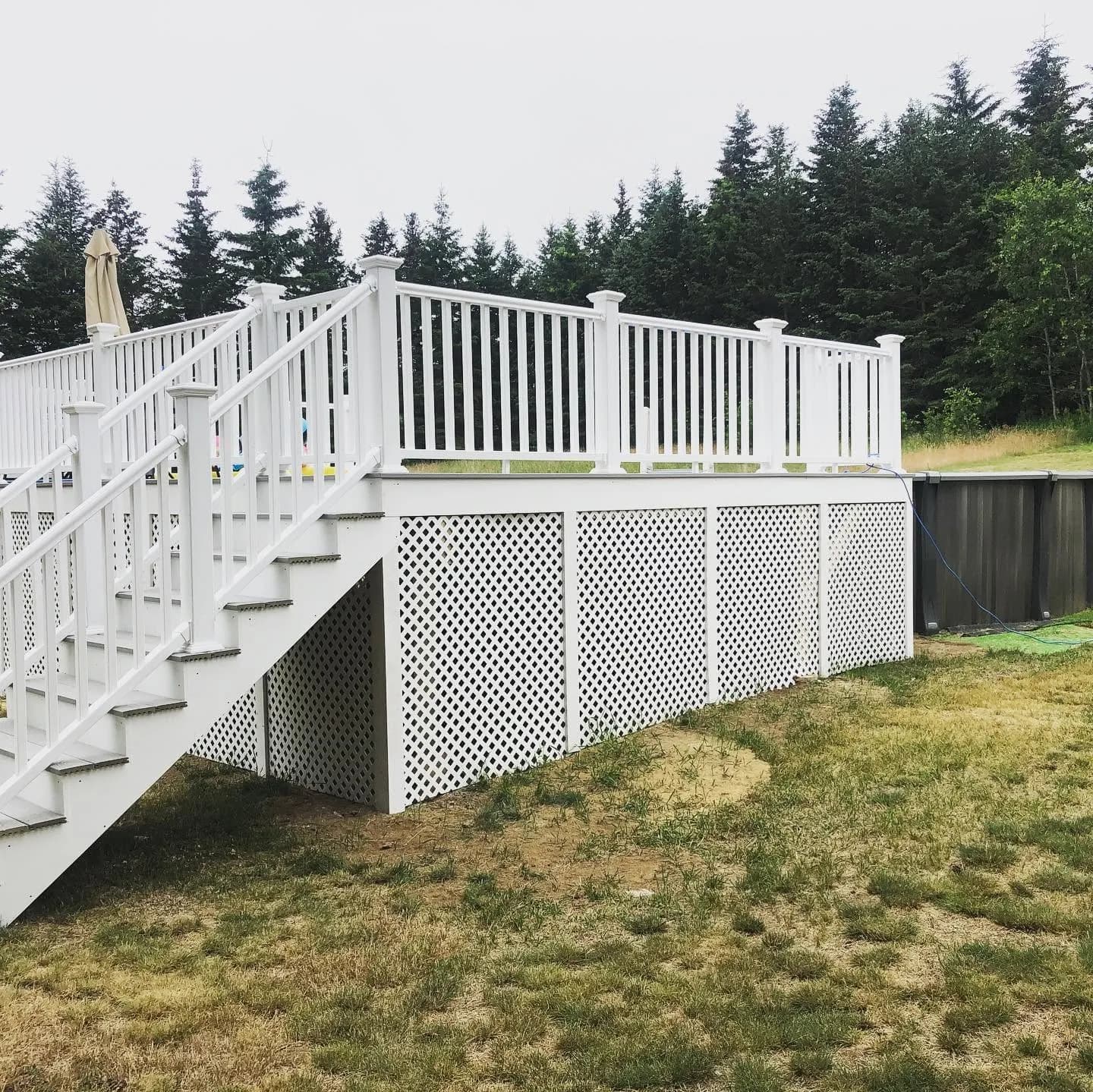 Above-ground pool deck with white railing — Decks project in Central NH by A&E Home Improvement