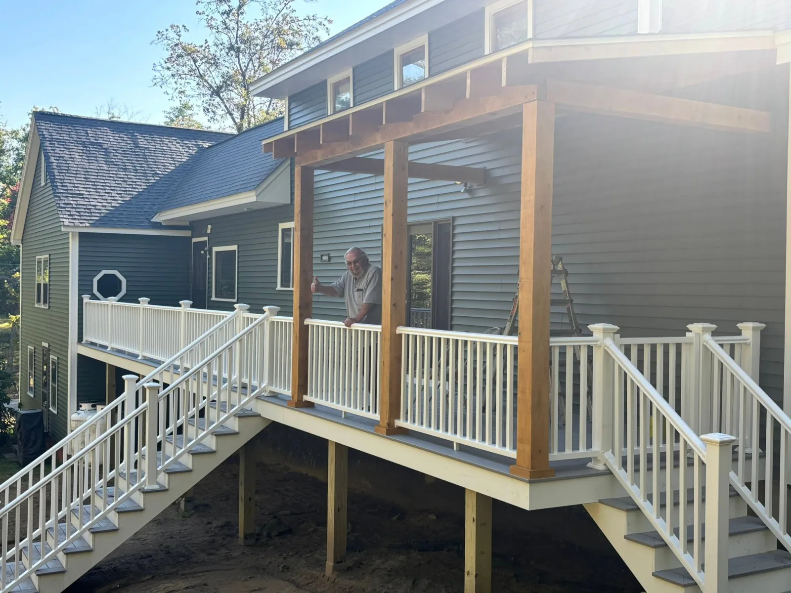 Deck with white railing — Decks project in Lakes Region, NH by A&E Home Improvement