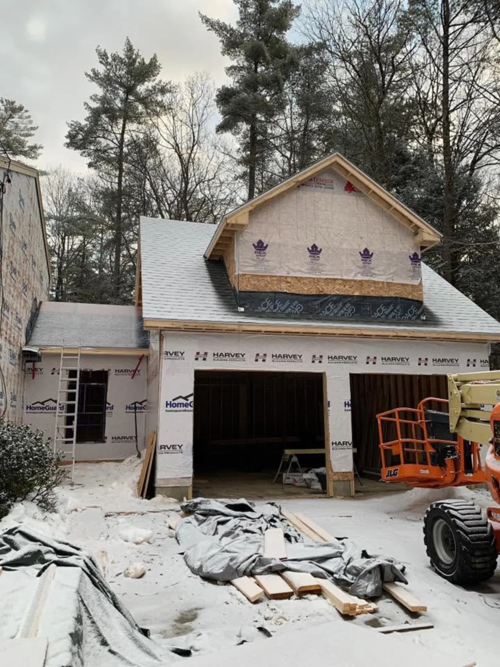 Two-bay garage build — Garages project in Lakes Region, NH by A&E Home Improvement