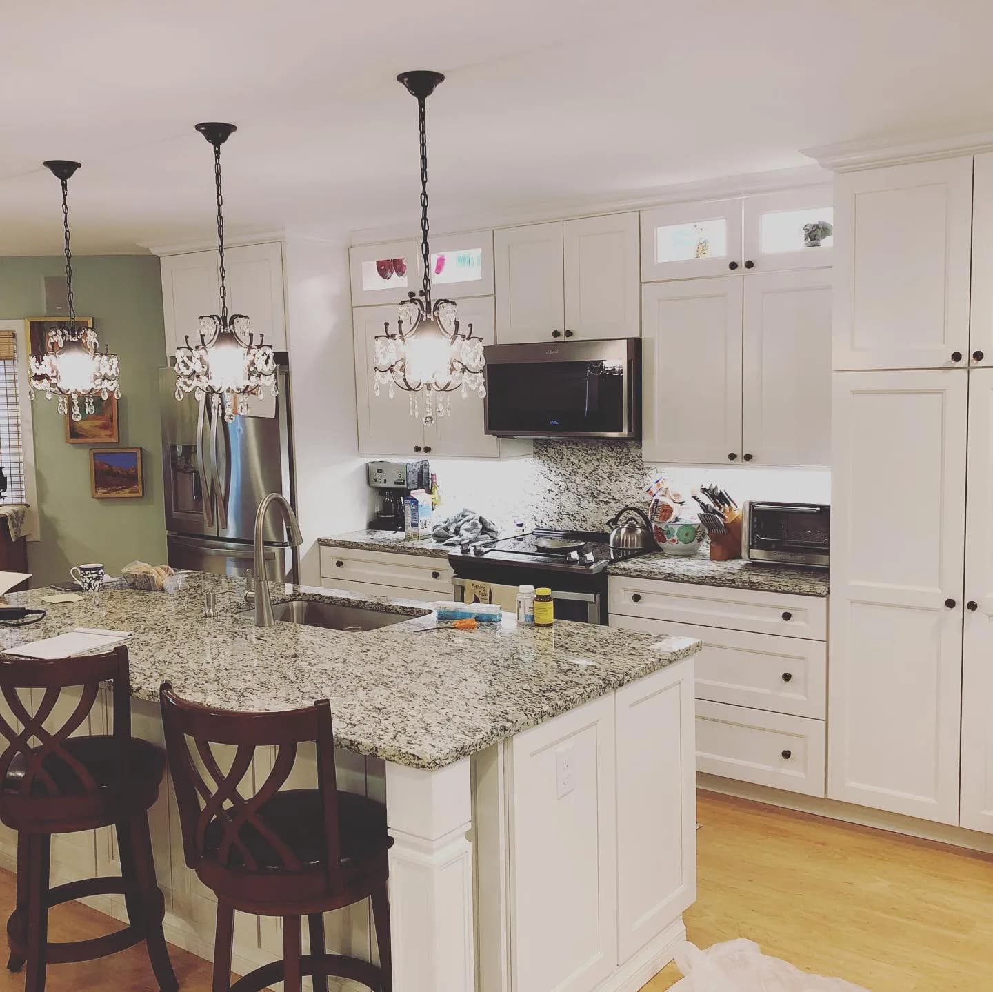 Modern white kitchen — General Contracting project in Lakes Region, NH by A&E Home Improvement