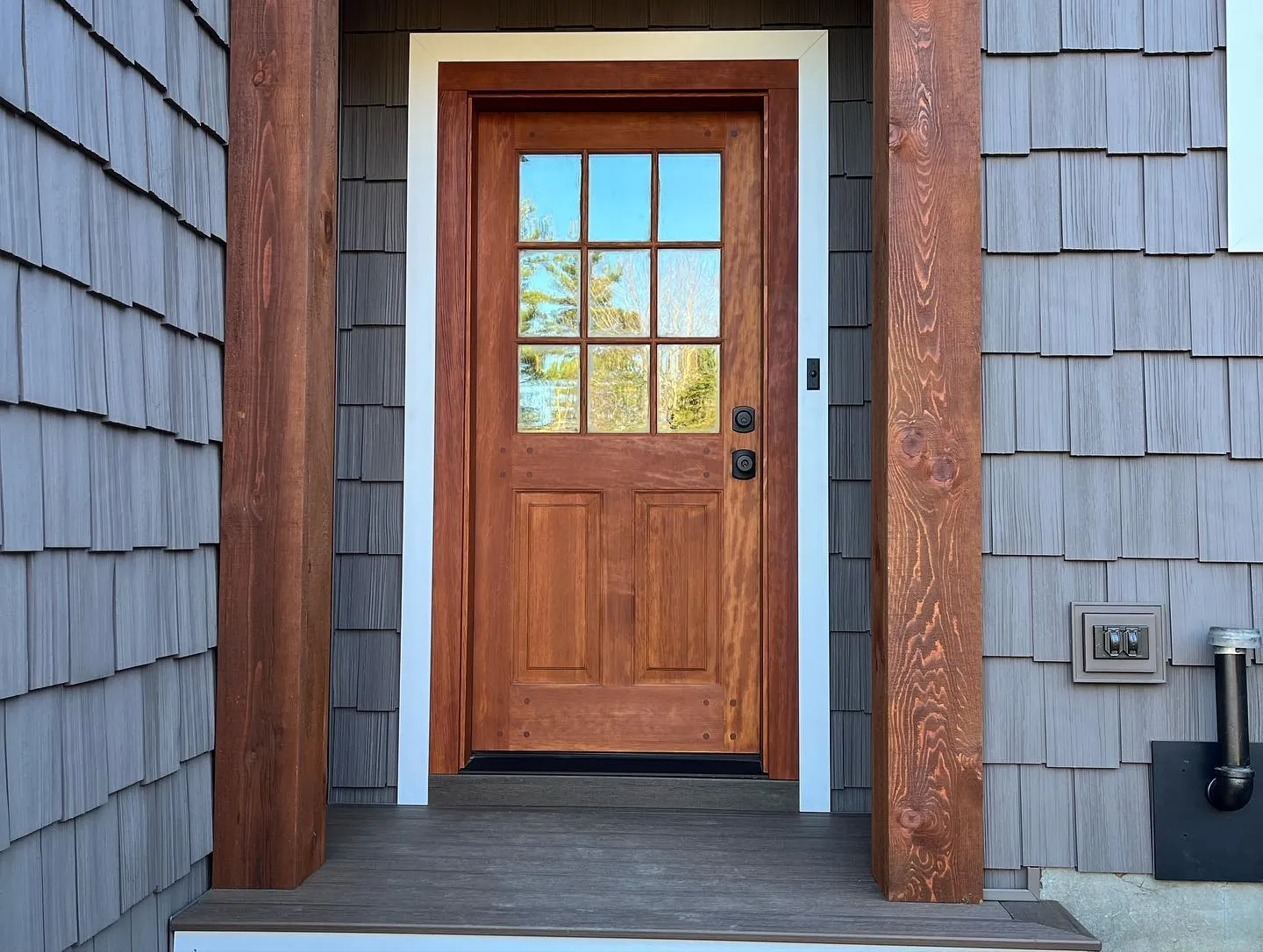 Shake siding and wood entry door — Siding project in Central NH by A&E Home Improvement