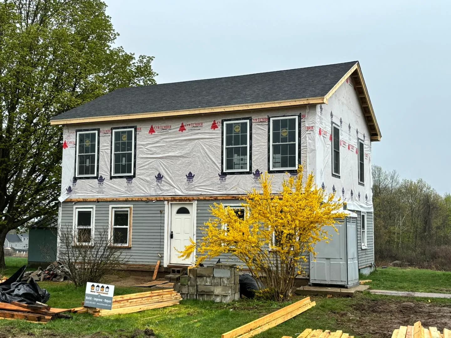 Two-story siding installation by A&E Home Improvement